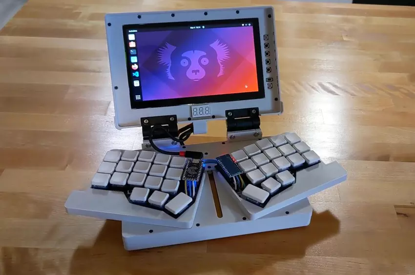 Dieser klobige handflächengroße DIY-Laptop verbirgt geschickt eine geteilte ergonomische Tastatur